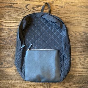 Black quilted backpack